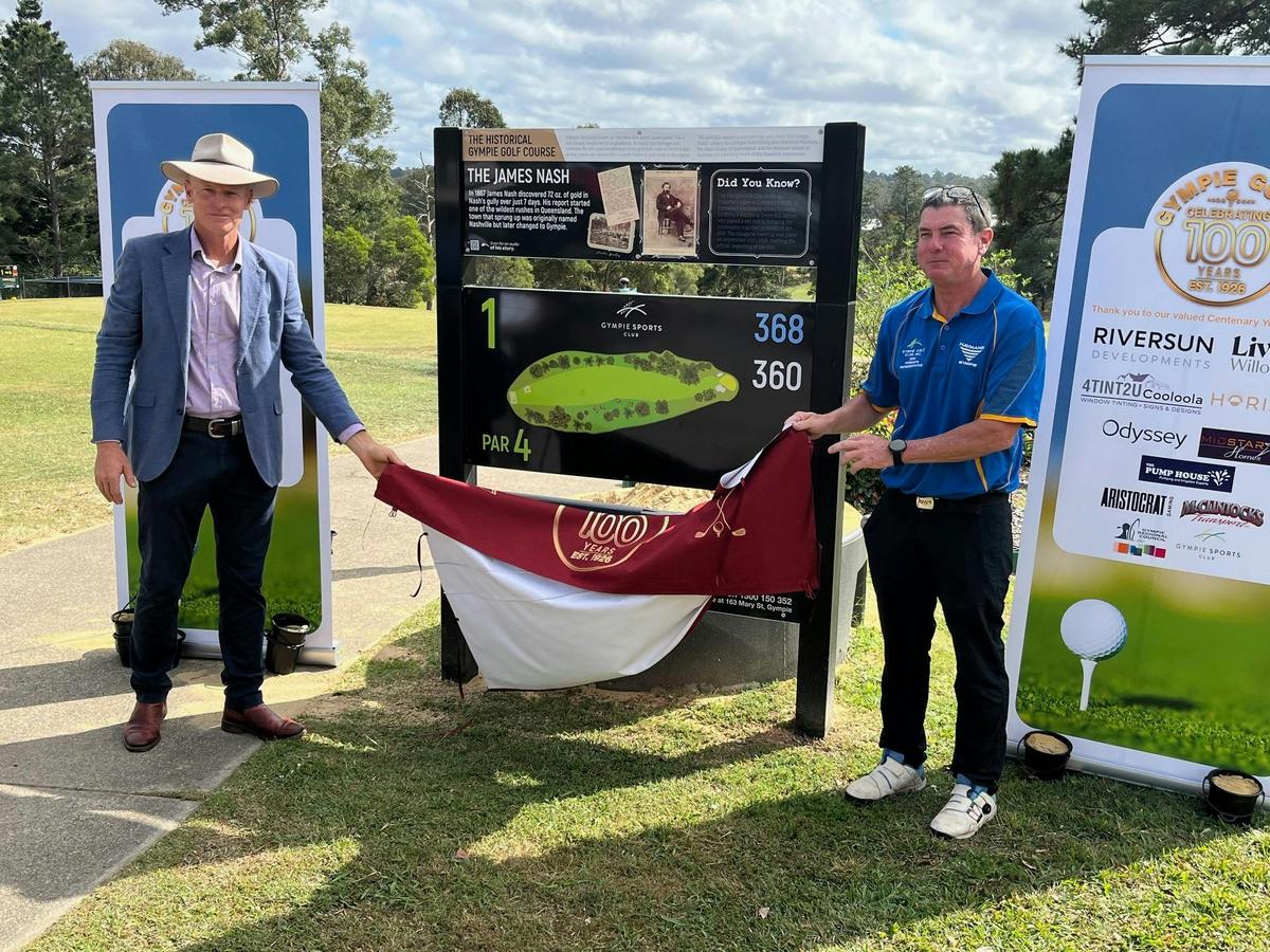 Gympie Mayor Glen Hartwig unveils historical gold mine signs with GGC President Brad Morgan