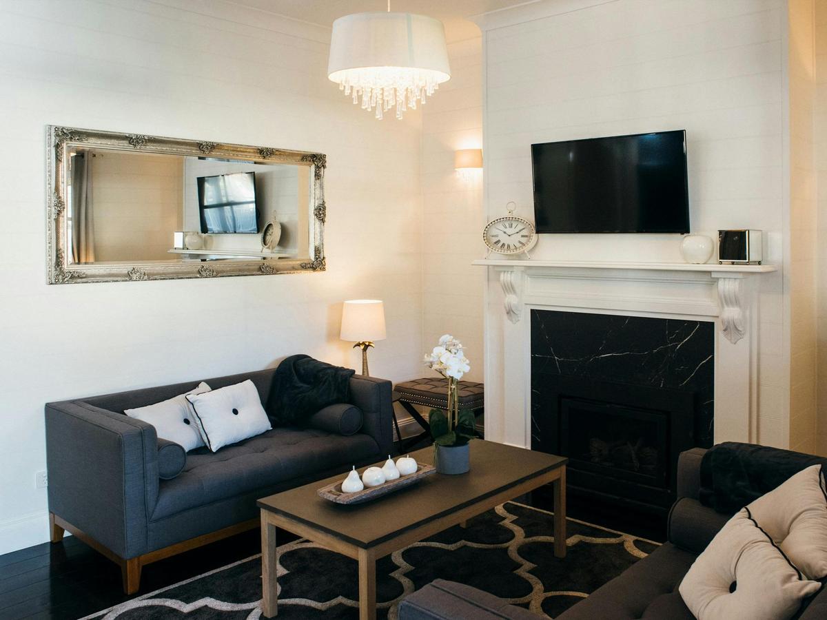 The cosy fireplace and lounge at the back section