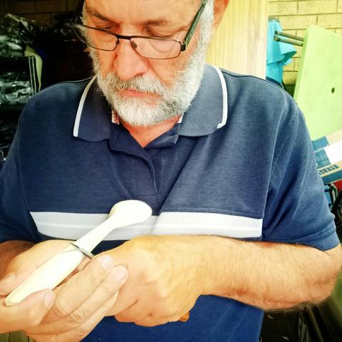 Hand crafted spoon display and spoon carving demonstration