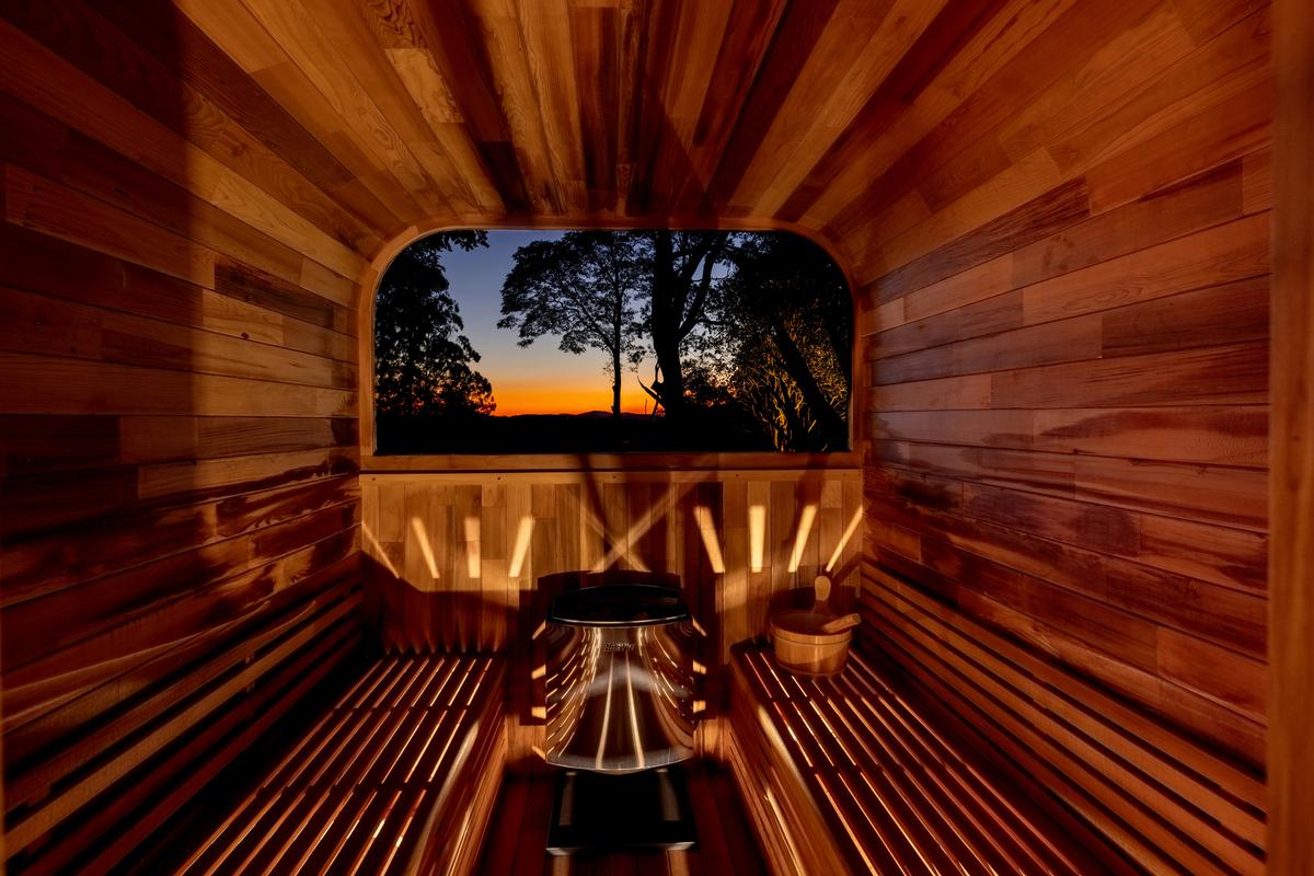 Private sauna with hinterland sunset