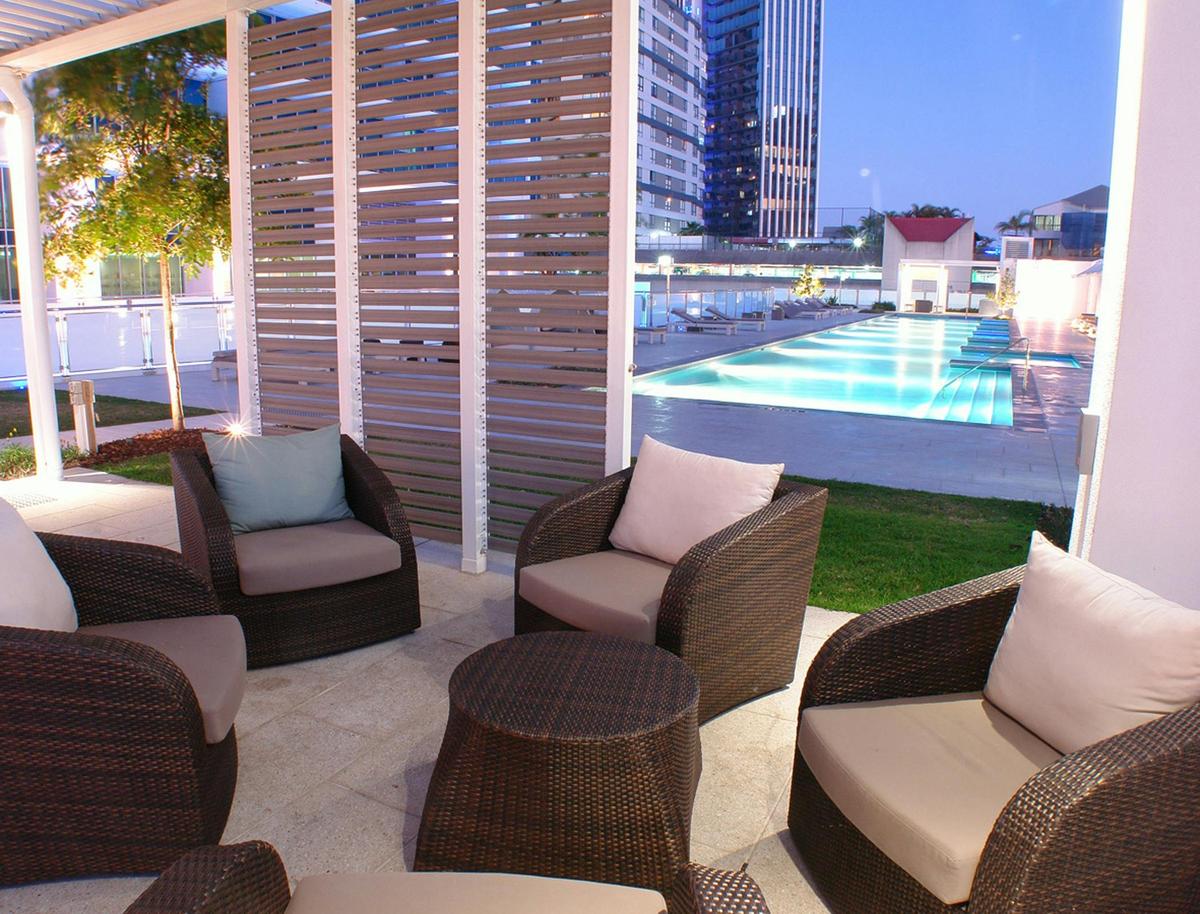Relax by the pool at The H Residences