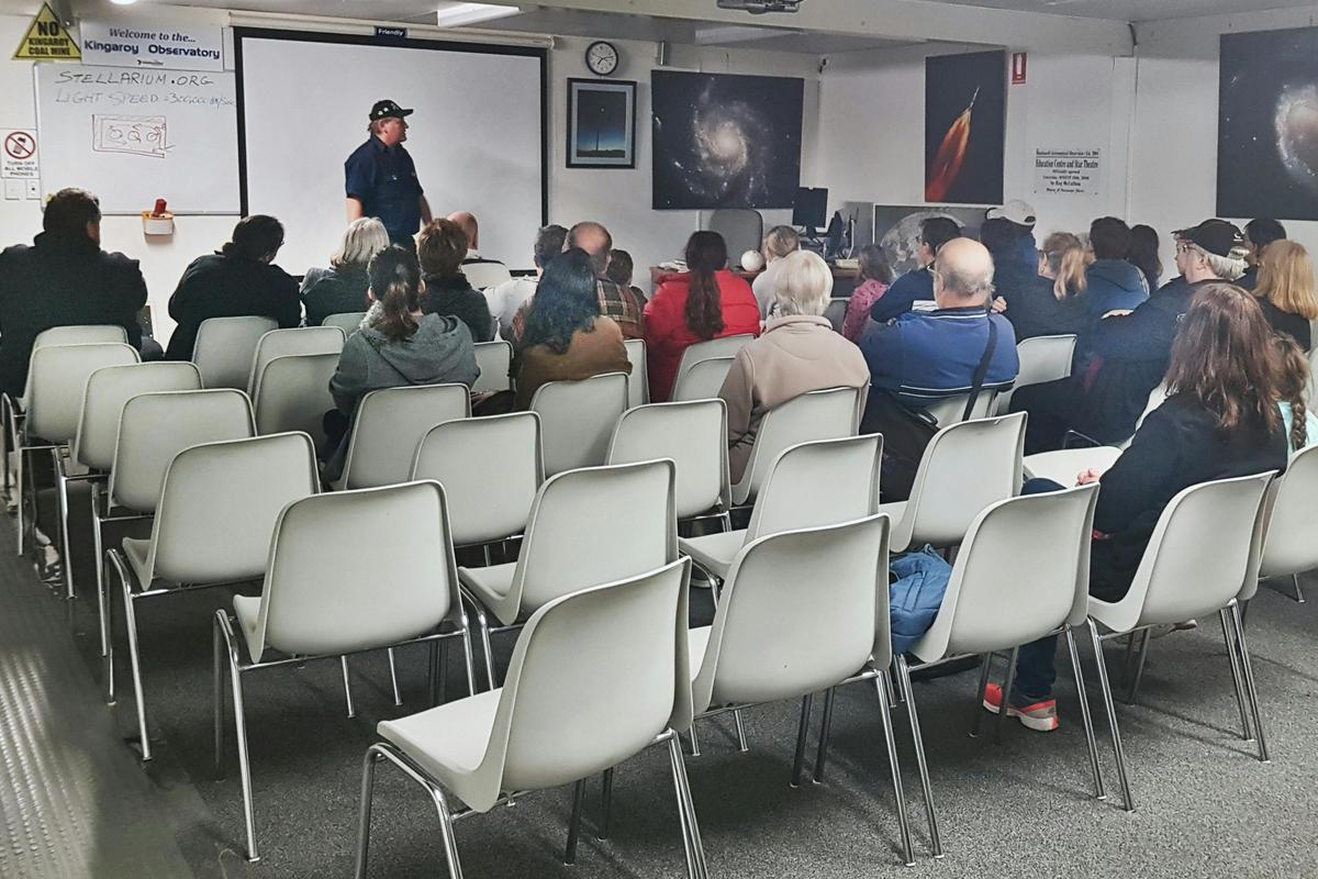 Visitors getting a brief of what they will be viewing in the telescopes