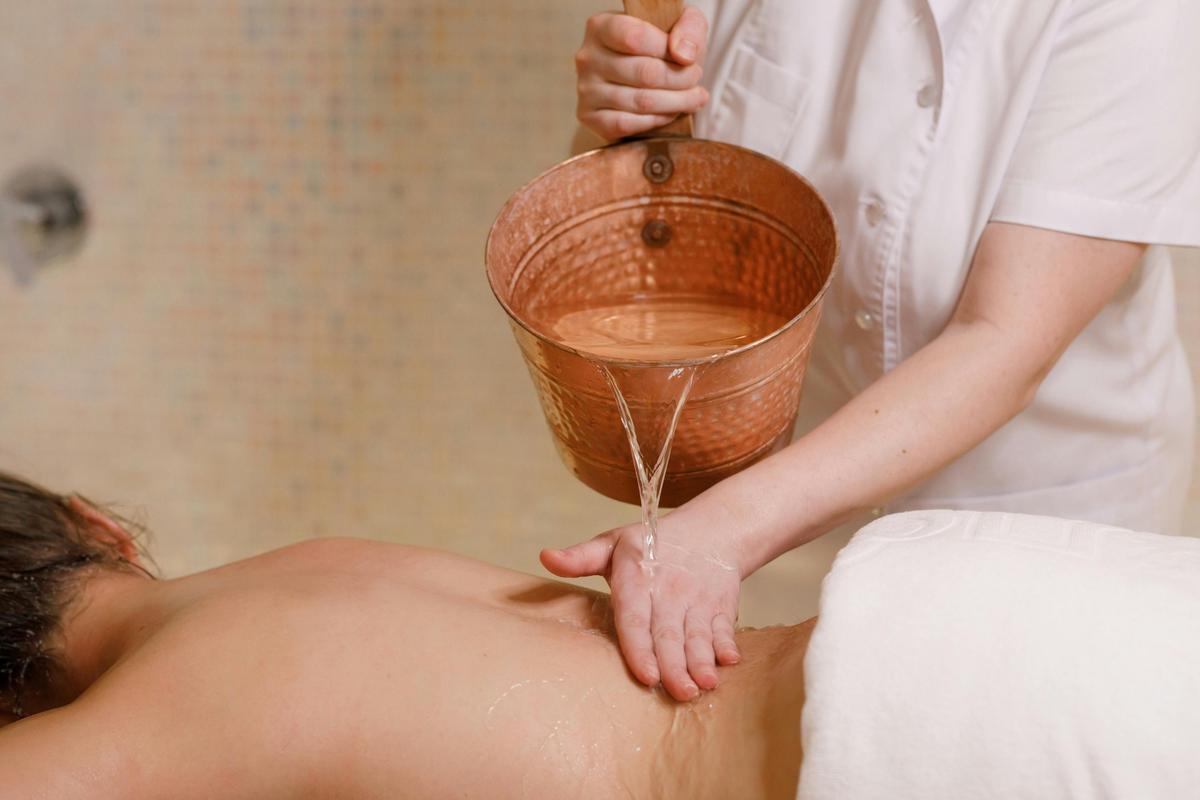 Therapist Performing Hammam Treatment at Kenz Beauty Spa and Moroccan Hammam