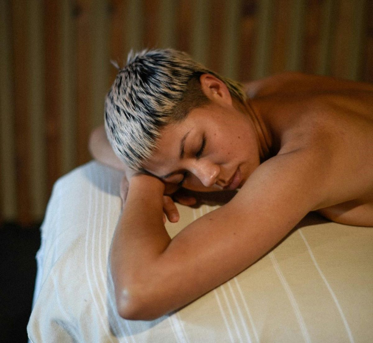 Woman enjoying her treatment at Ole Wellness