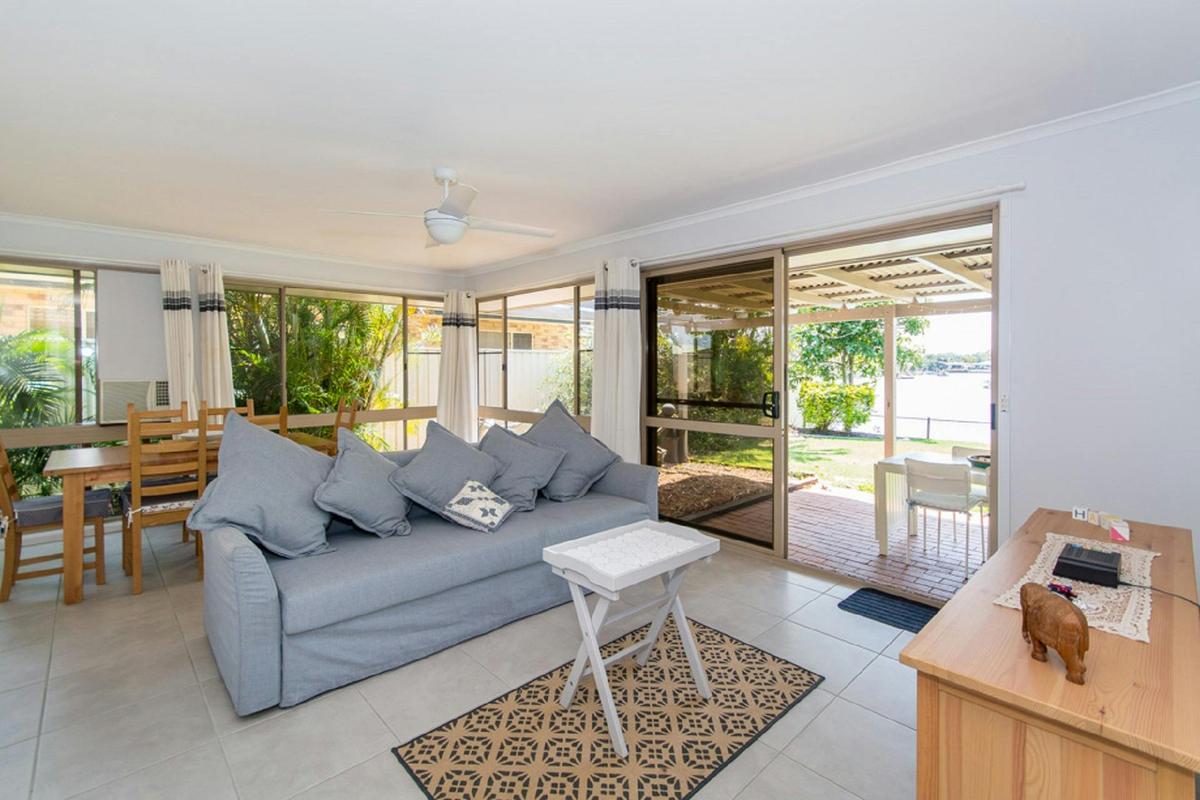Lounge room with canal views