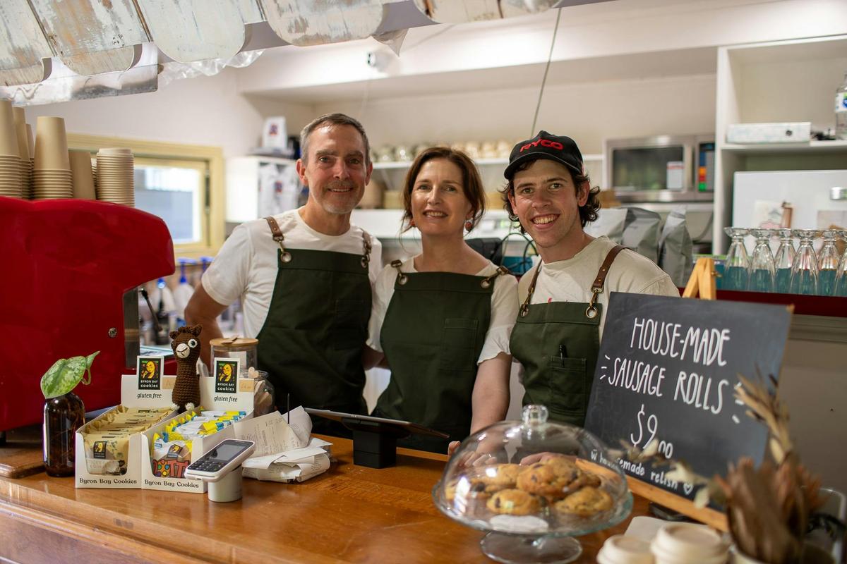 friendly staff greeting customers at the front counter