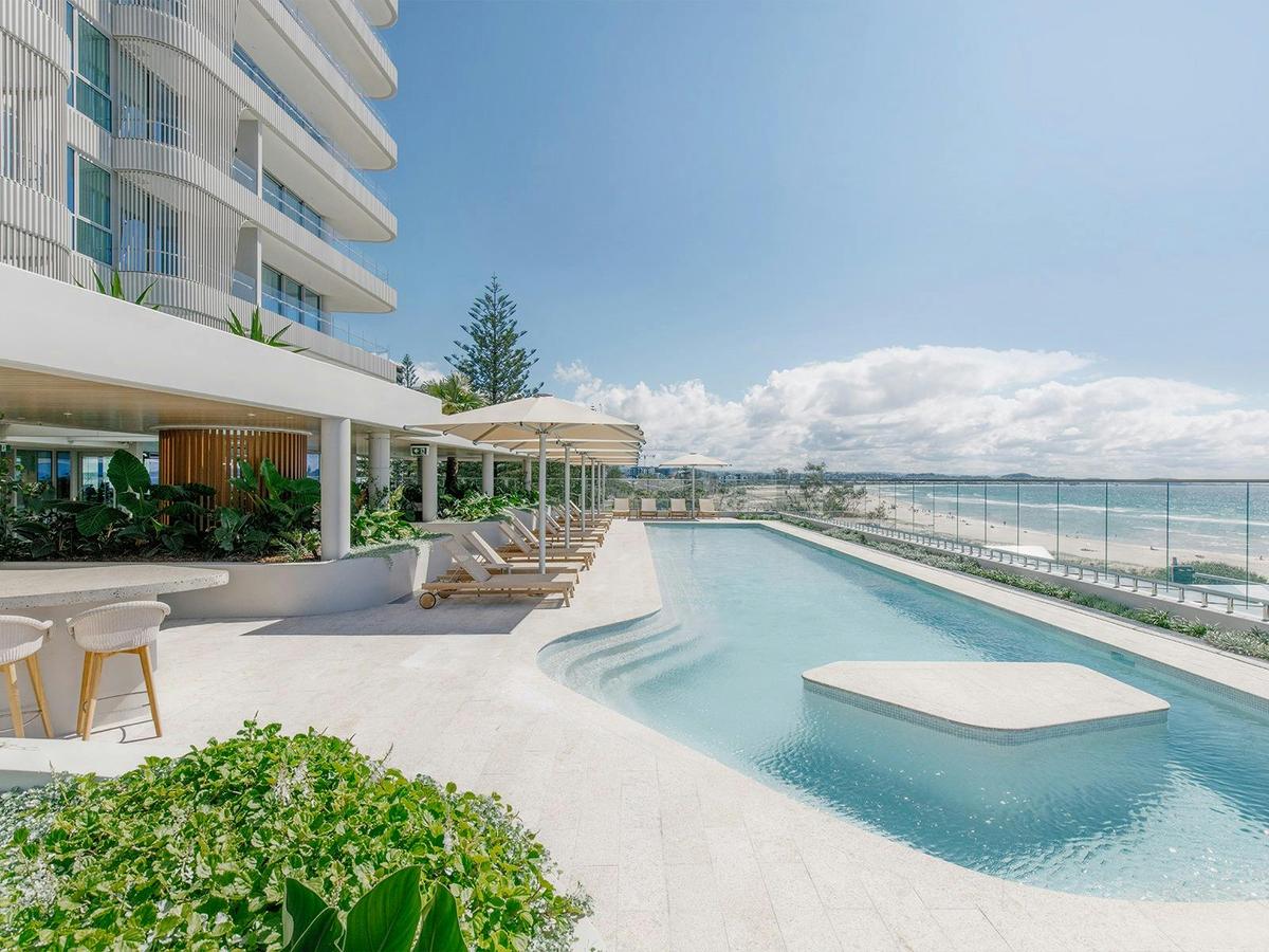 Hotel-style heated 25m pool with expansive ocean views.