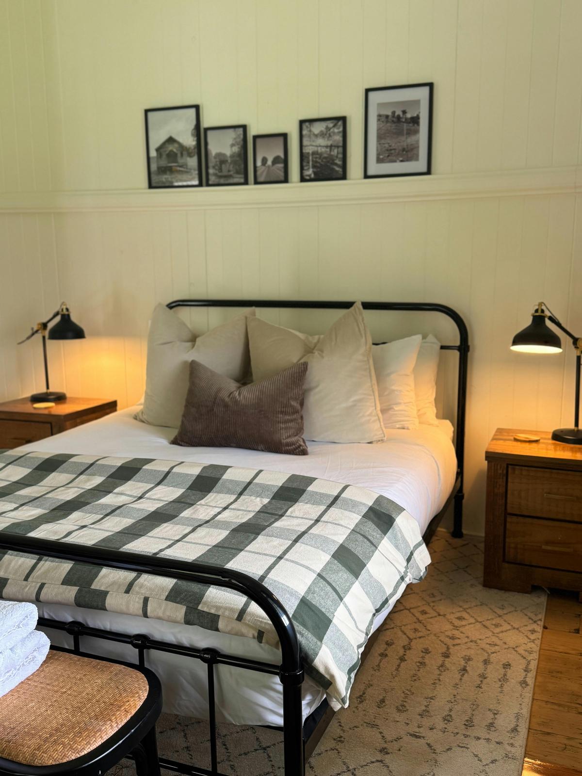 Queen room 1 with luxury linen overlooking the deck and property