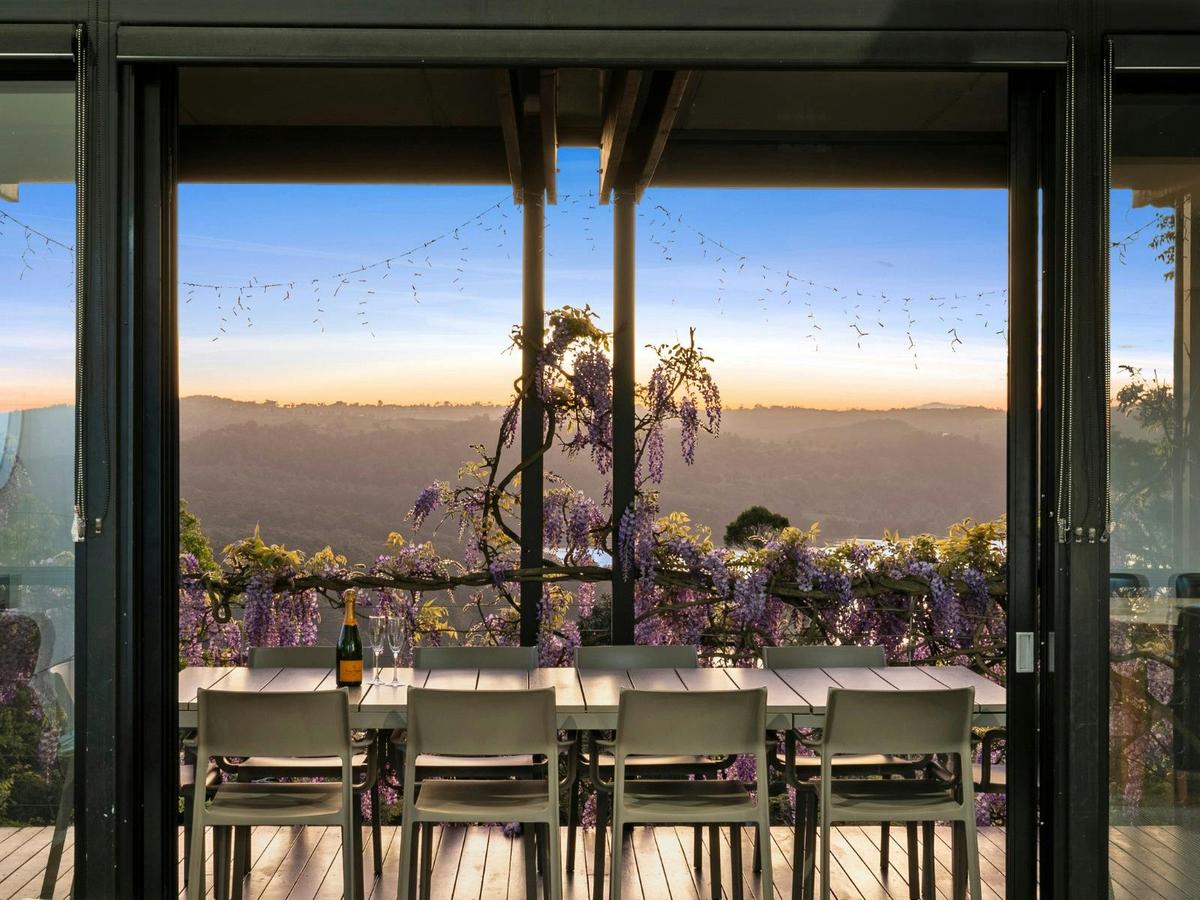 Outdoor dining on balcony with sweeping views