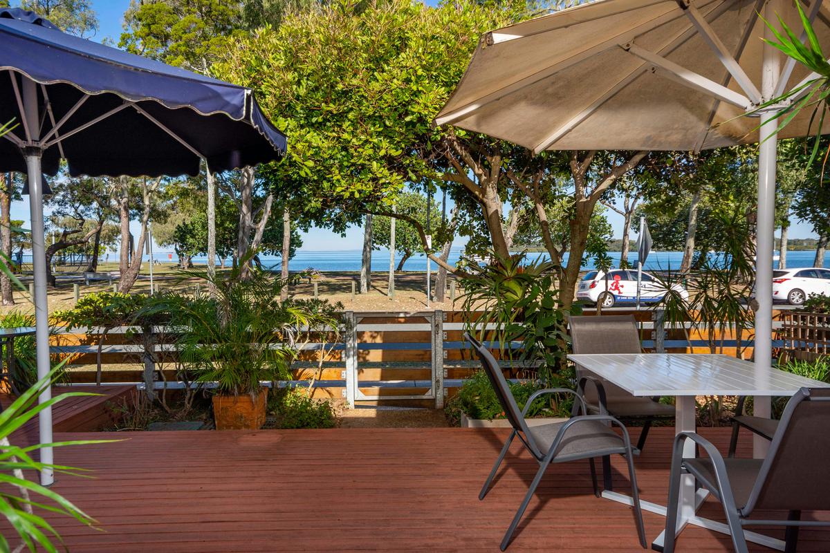 Outdoor entertainment area overlooking Pumicestone Passage