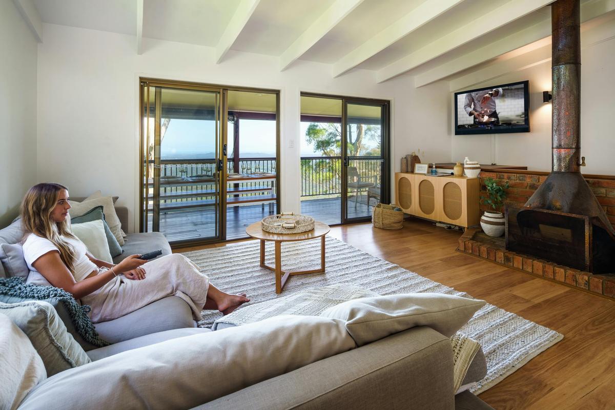 Relax in the charming living room with views and a fireplace