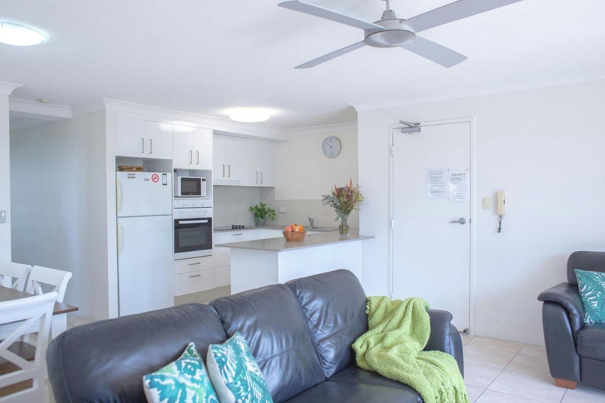 Kitchen, dining, living area.