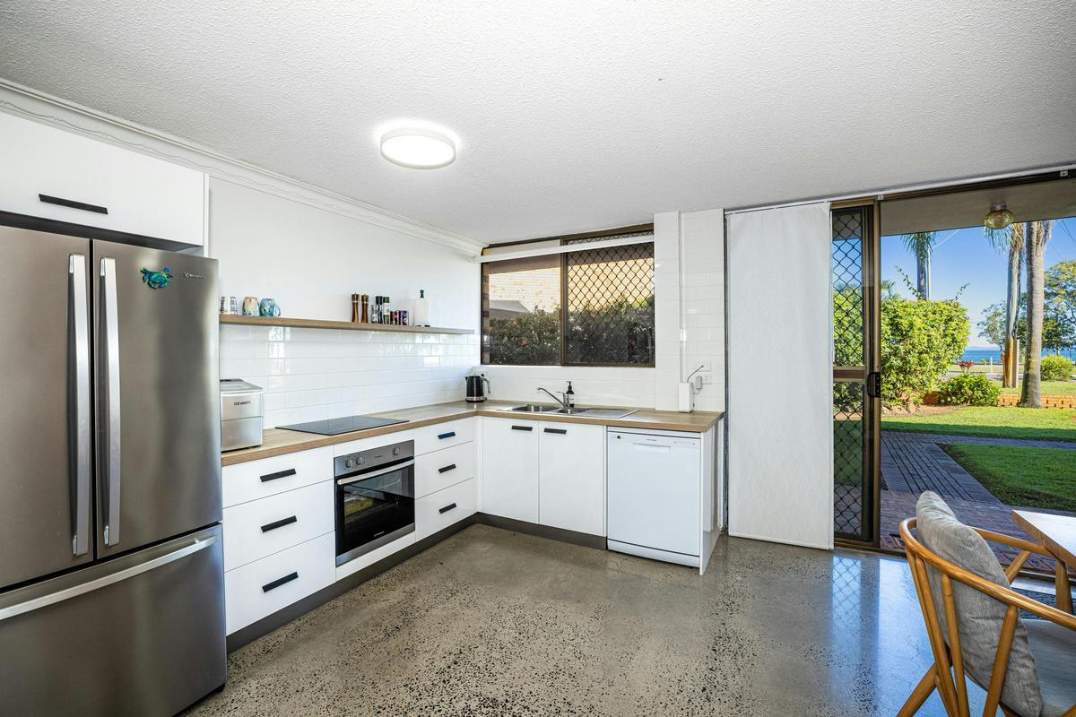 Kitchen and dining with water views