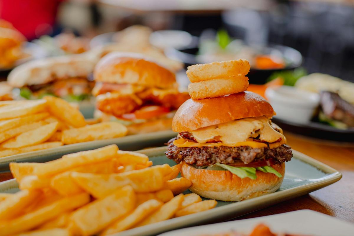 Try our famous Orion Beef Burger! An Angus beef patty, special Orion burger sauce and onion rings