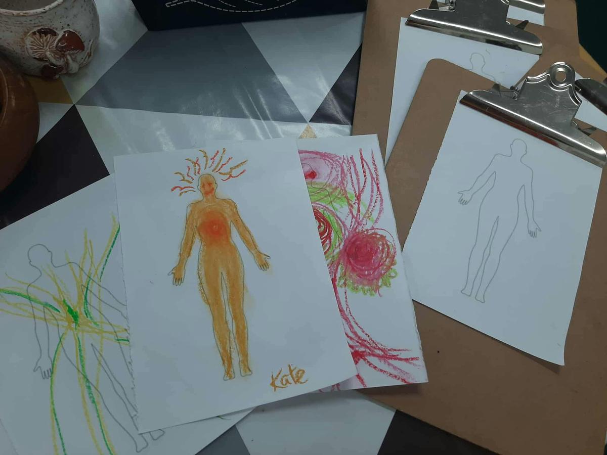 Collection of mixed media artworks on a table