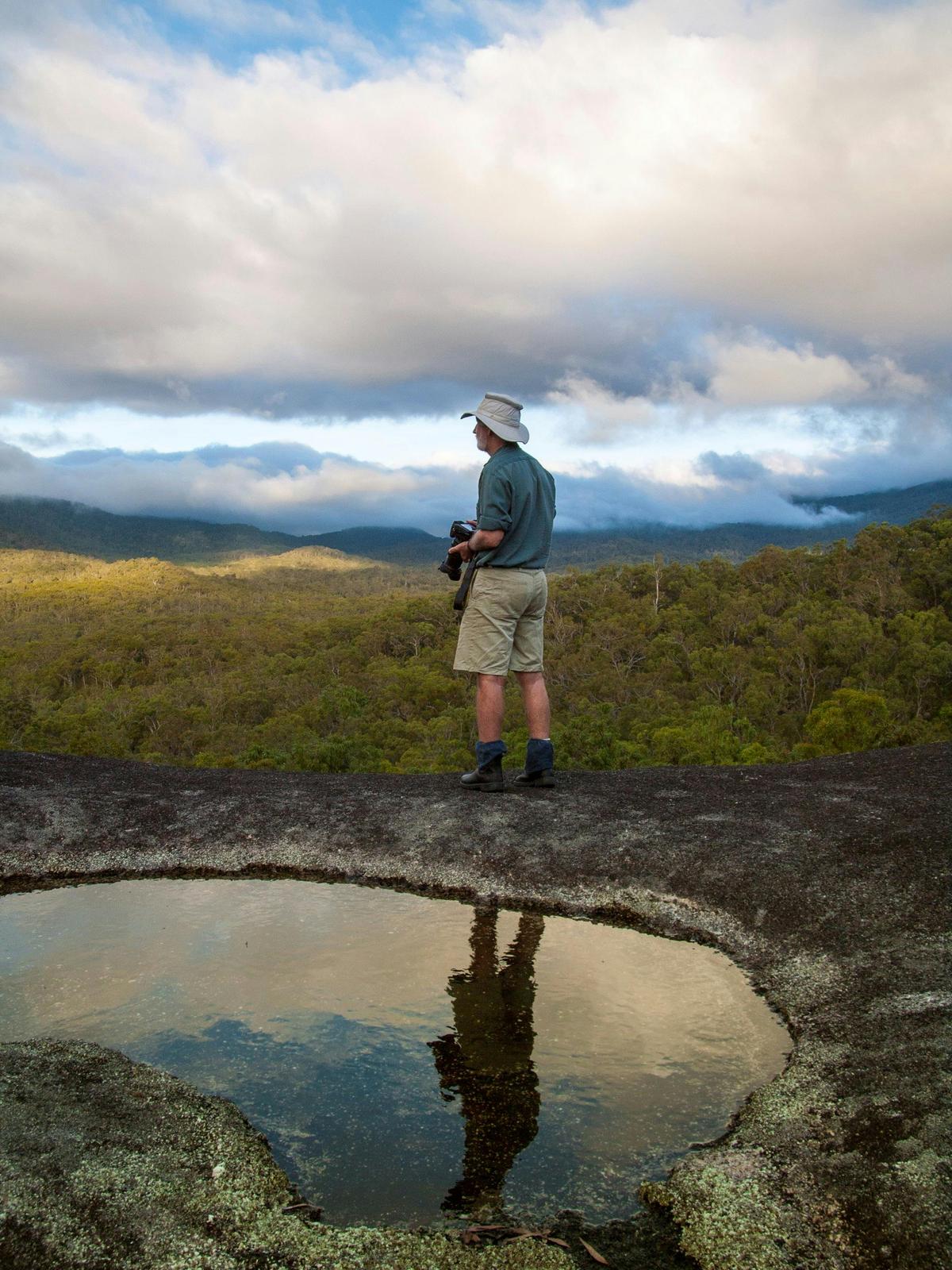 Sunset and reflections atop a great lookout within the wet tropics world heritage area