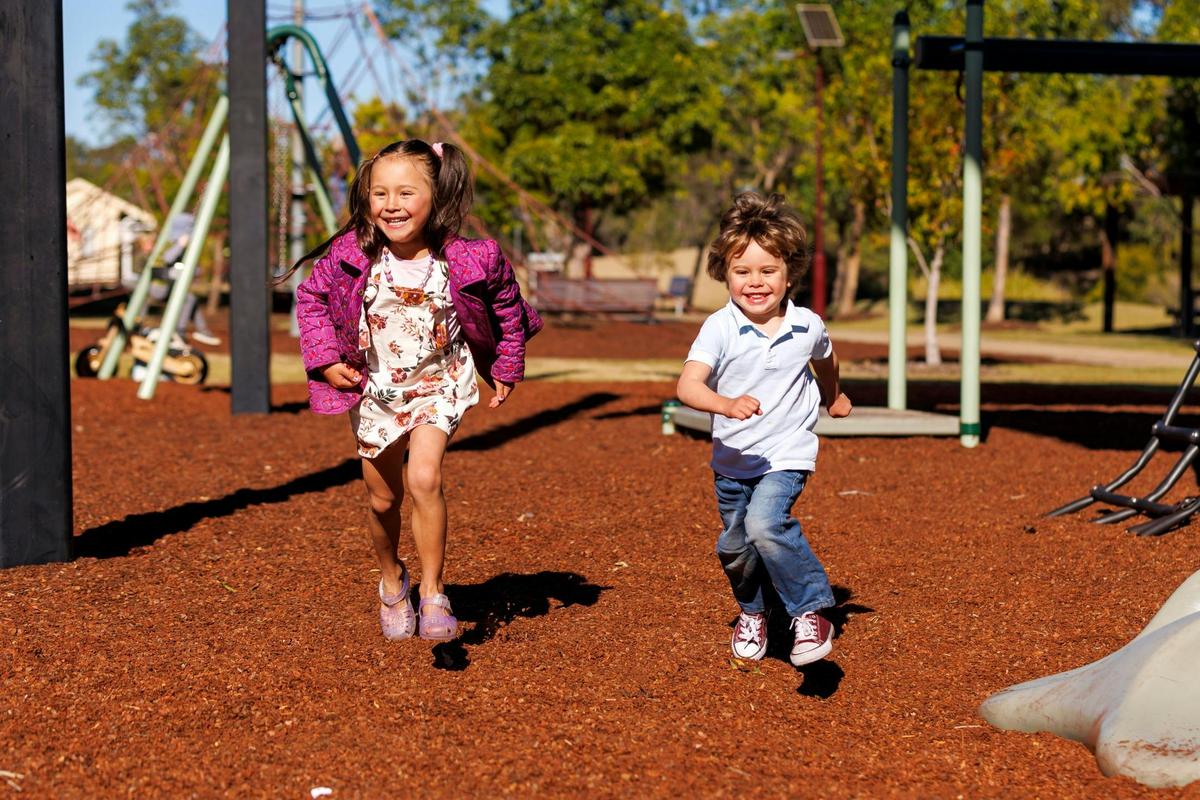 Children playing in the park at Pipeliner Park