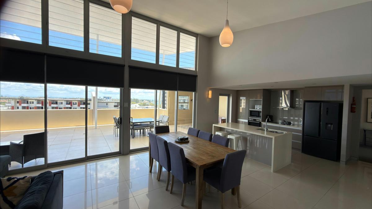 4-Bedroom Ocean & City View Apartment – Top Floor