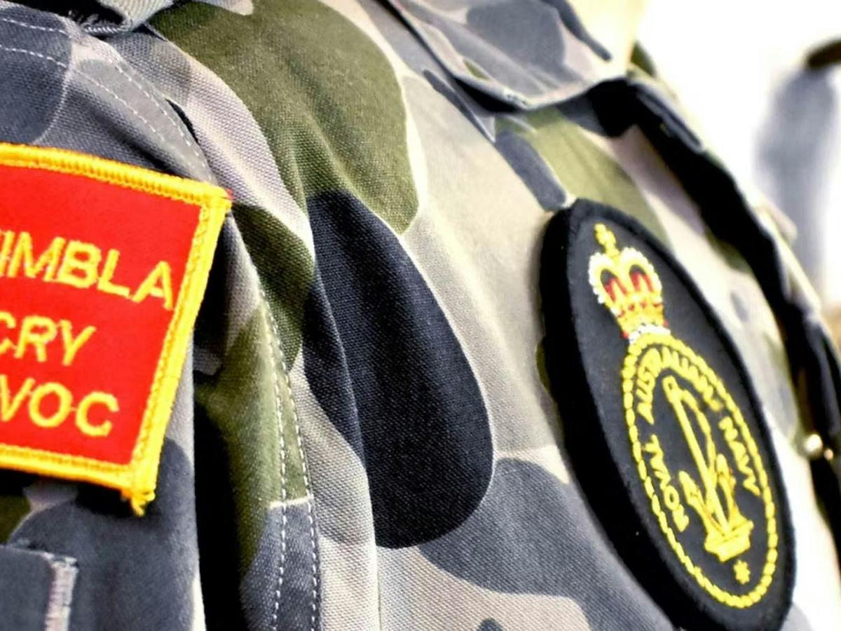 Naval uniform and insignia from the museum's collection.