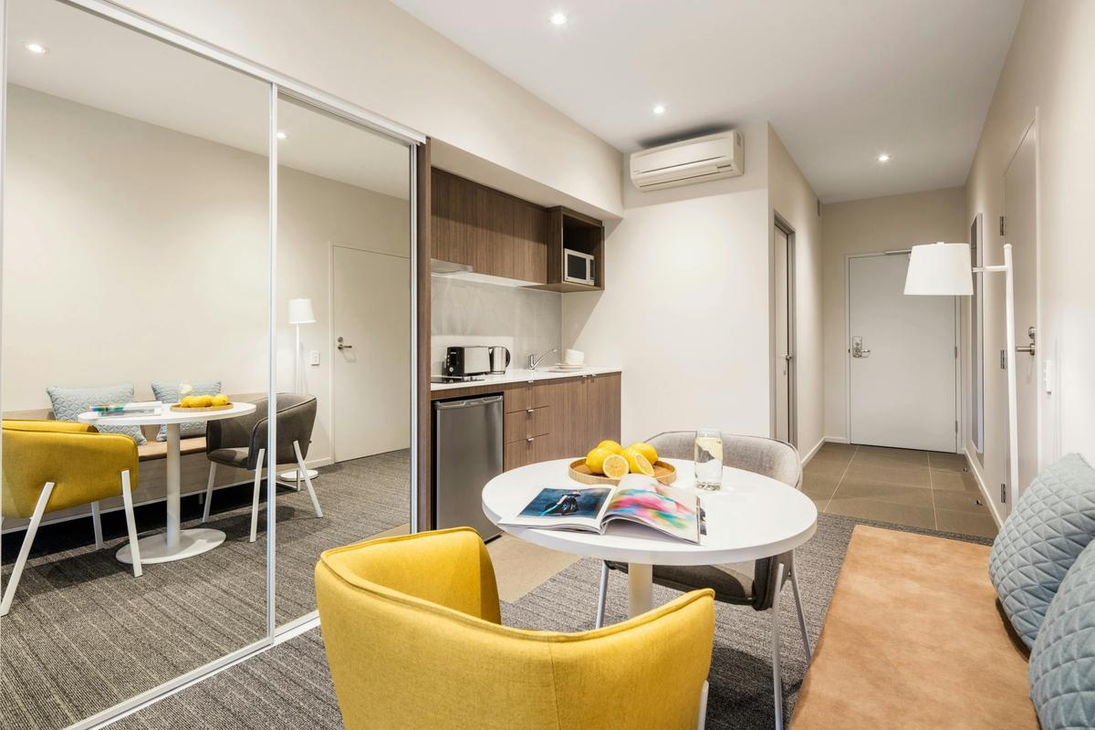 Studio Apartment Dining and Kitchenette