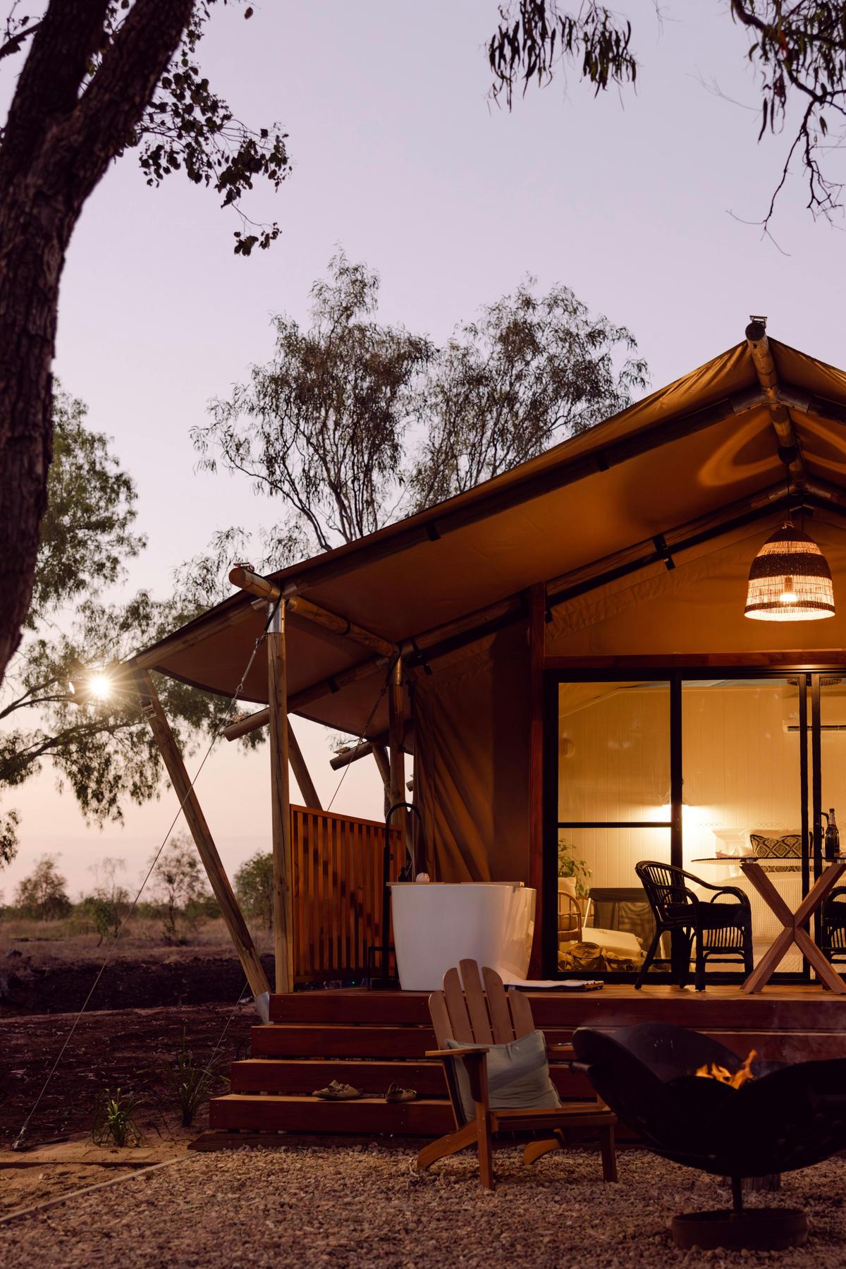 Tent at night with fire