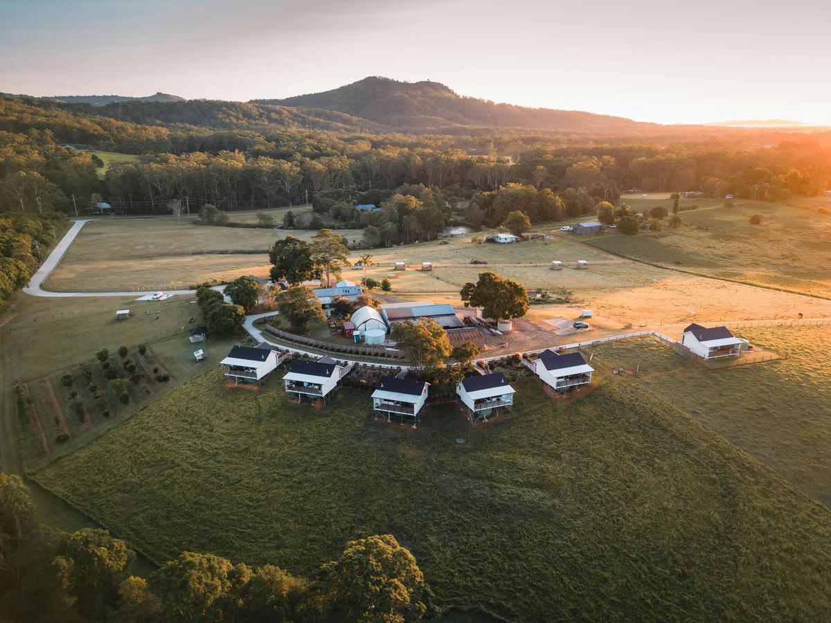 The sun rising over the property. 6 luxury cabins on a 34-acre hobby farm