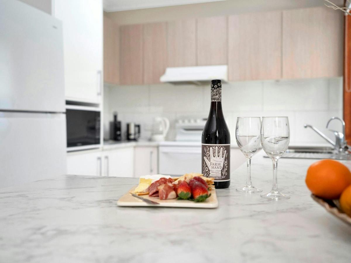 Fully equipped kitchen with island bench