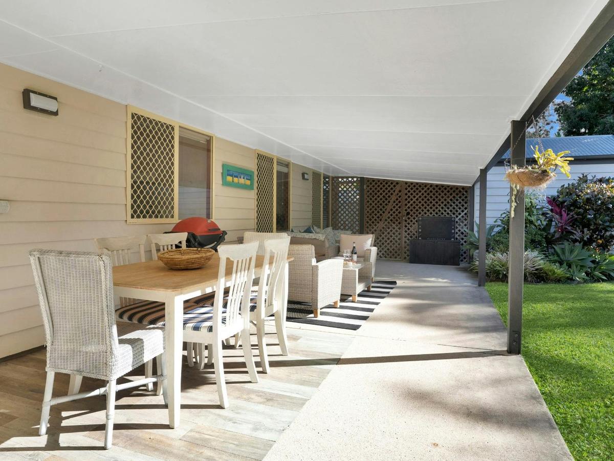 Balcony with outdoor dining, lounge area and BBQ