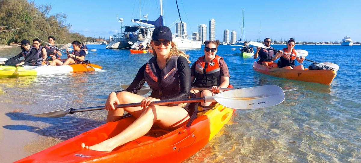 A guest preparing to launch a kayak on the Gold Coast Broadwater with Seaway Kayaking Tours.