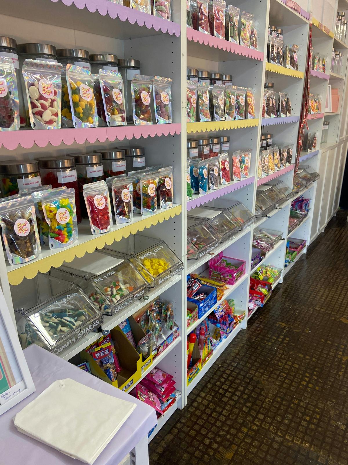 Colourful confectionery shelves inside Sugar Rush Dayboro in Dayboro village.