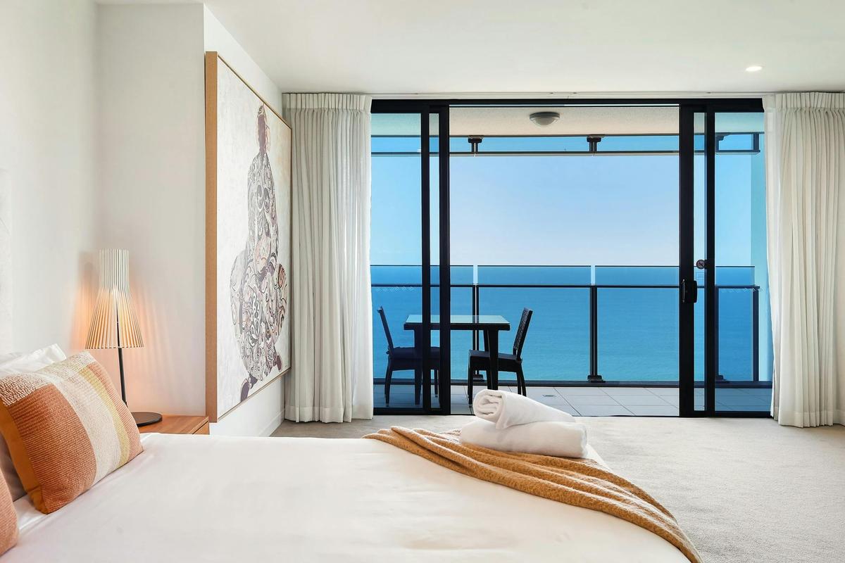 Master bedroom on the second floor with ensuite, own balcony with ocean views Gold Coast Holidays