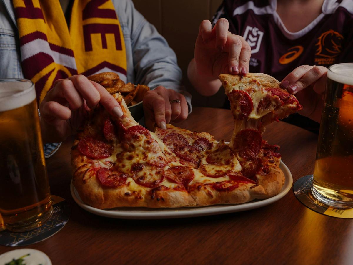People eating pizza