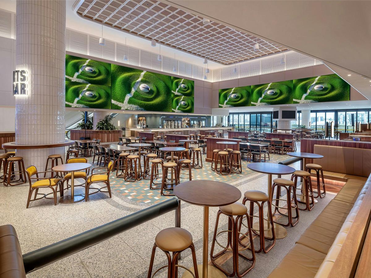 A large bar with big screen tvs