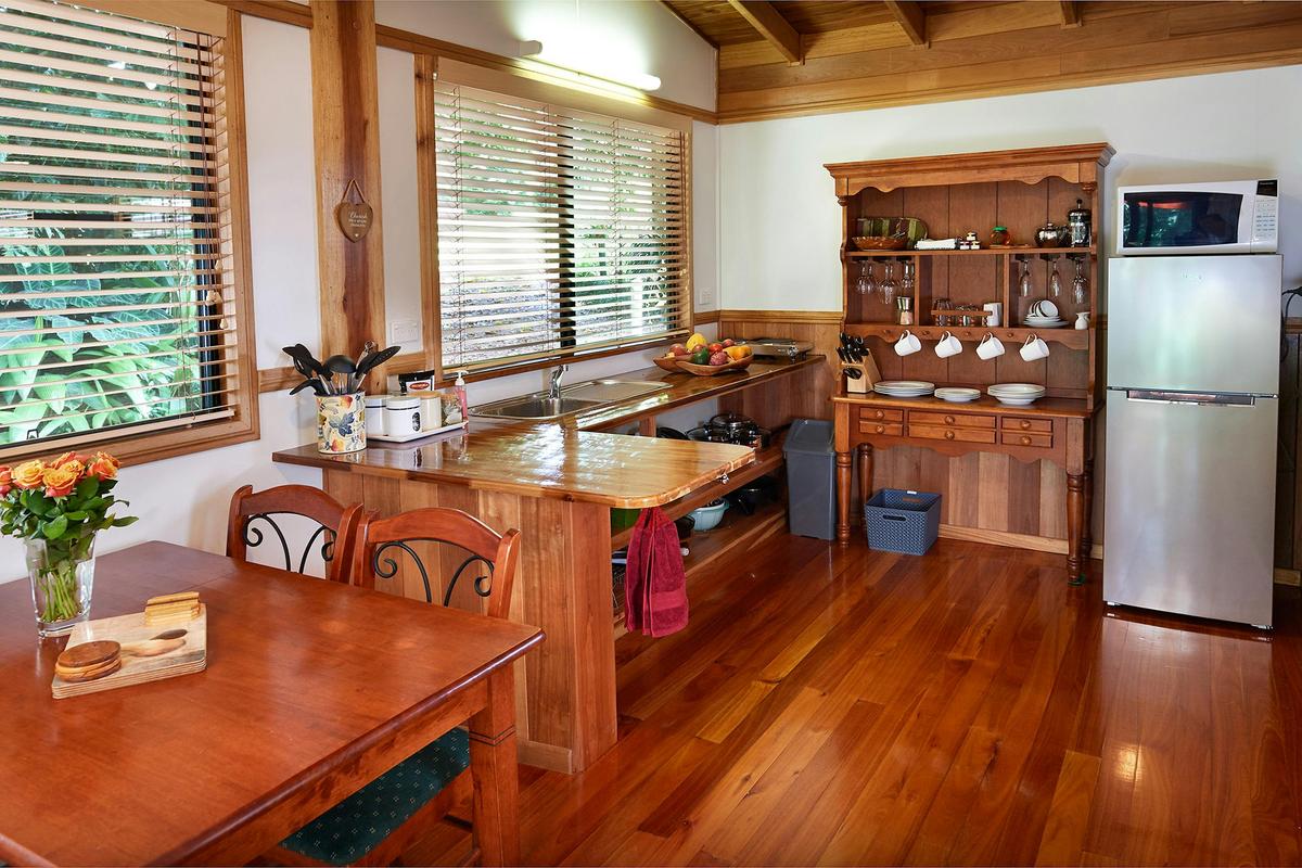 Fully self-contained kitchen and dining area at Sharlynn