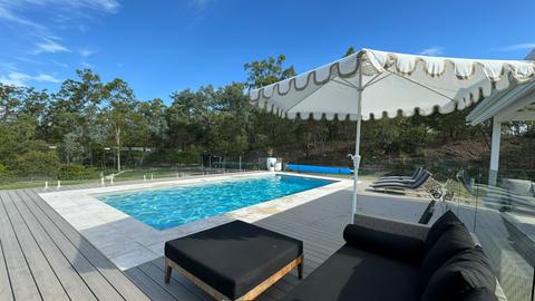 Suburban Poolside Caravan Retreat