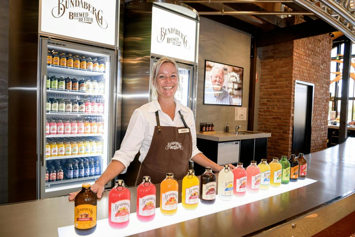 Barrel Team member at the tasting bar with the Bundaberg Brewed Drinks range on show.