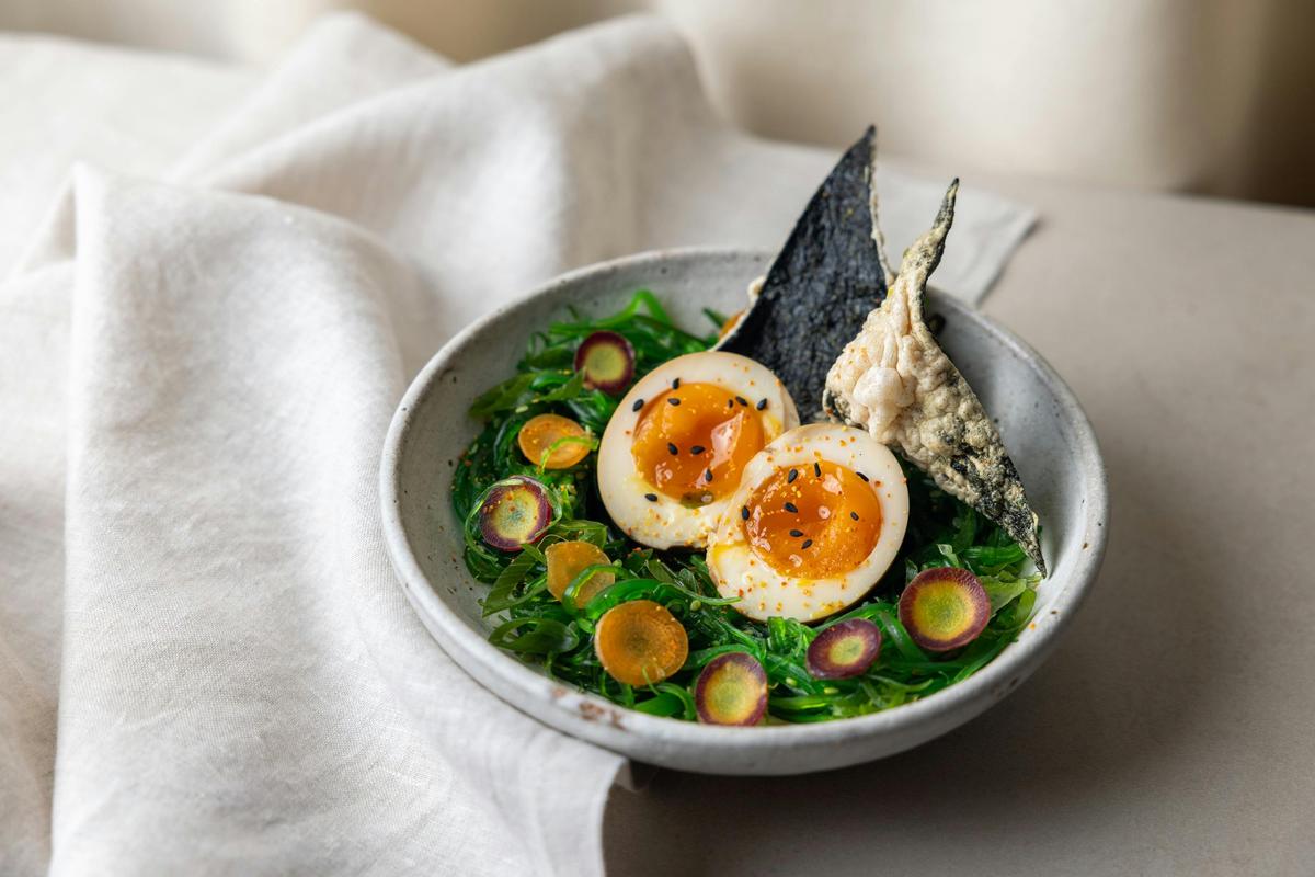 Soy marinated egg, fried nori chip, wakame