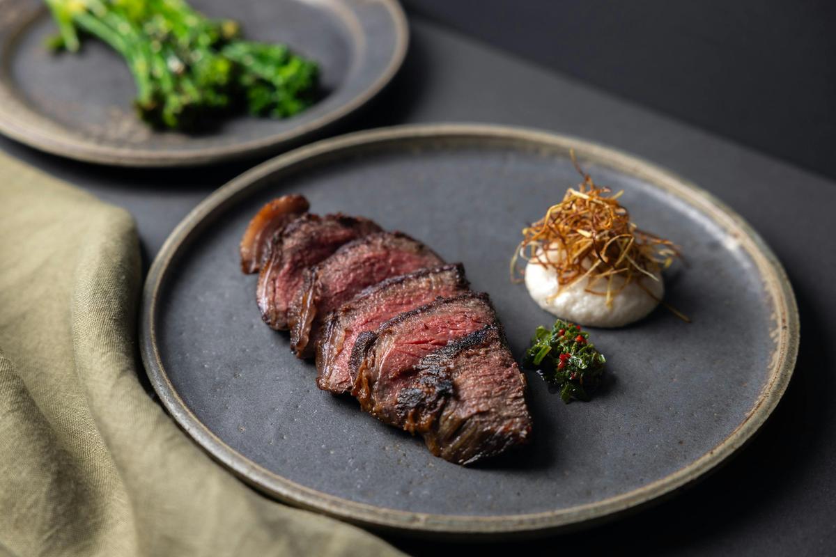 Wagyu rump cap 8+, herb sauce, alliums