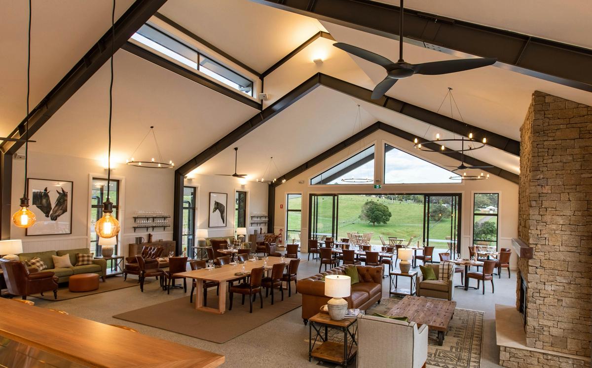 The Paddock restaurant's windows maximise views of rolling green hills