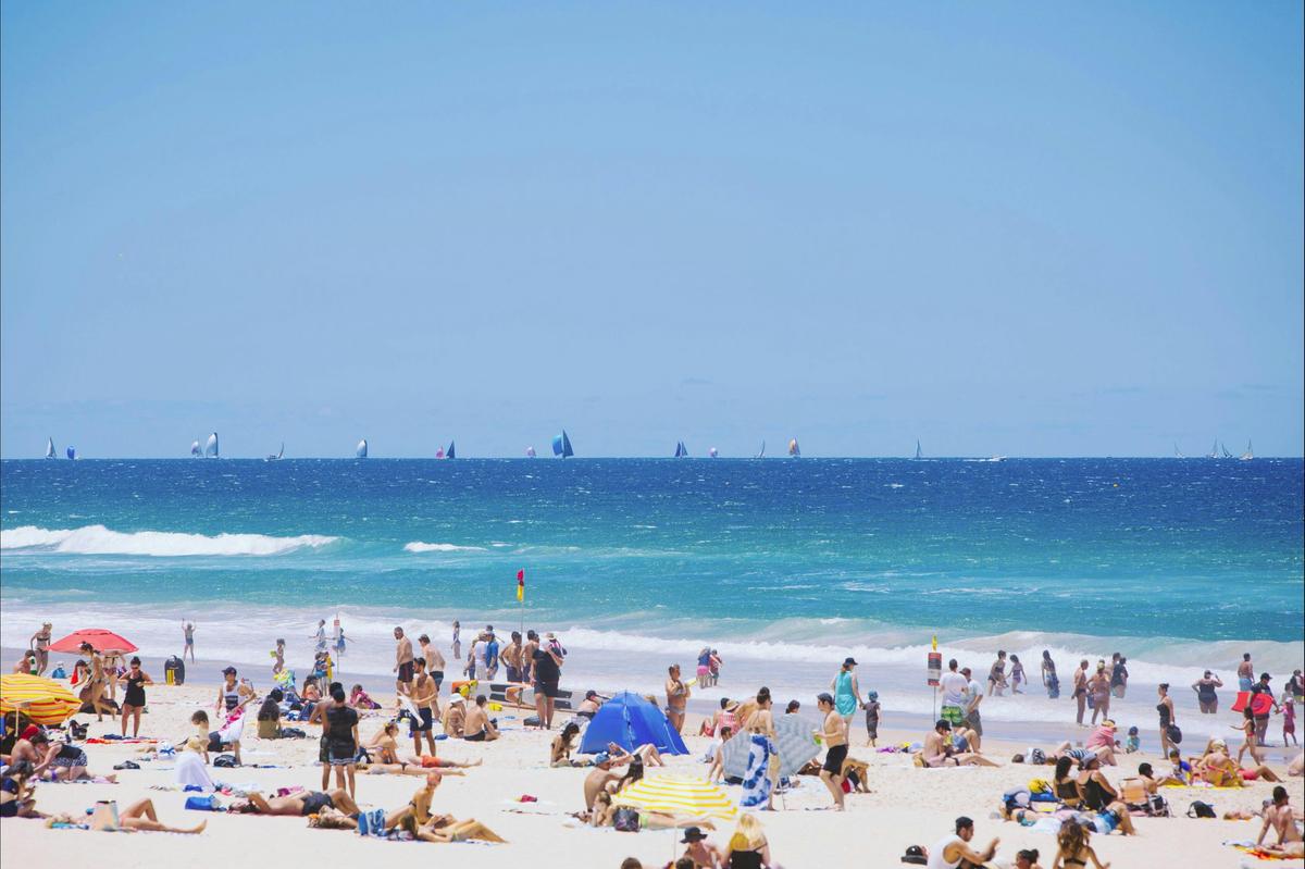 People on beach landscape