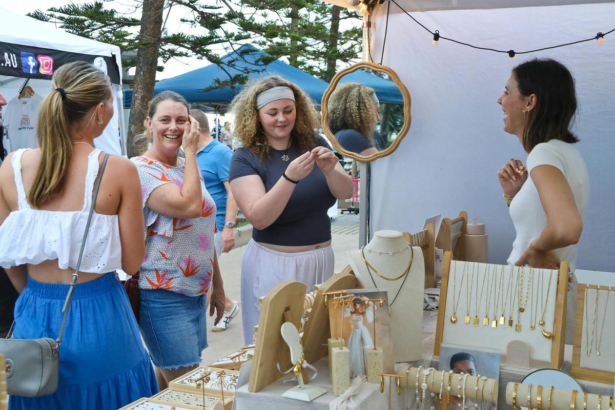 Trying on jewellery at Surfer's Paradise Markets