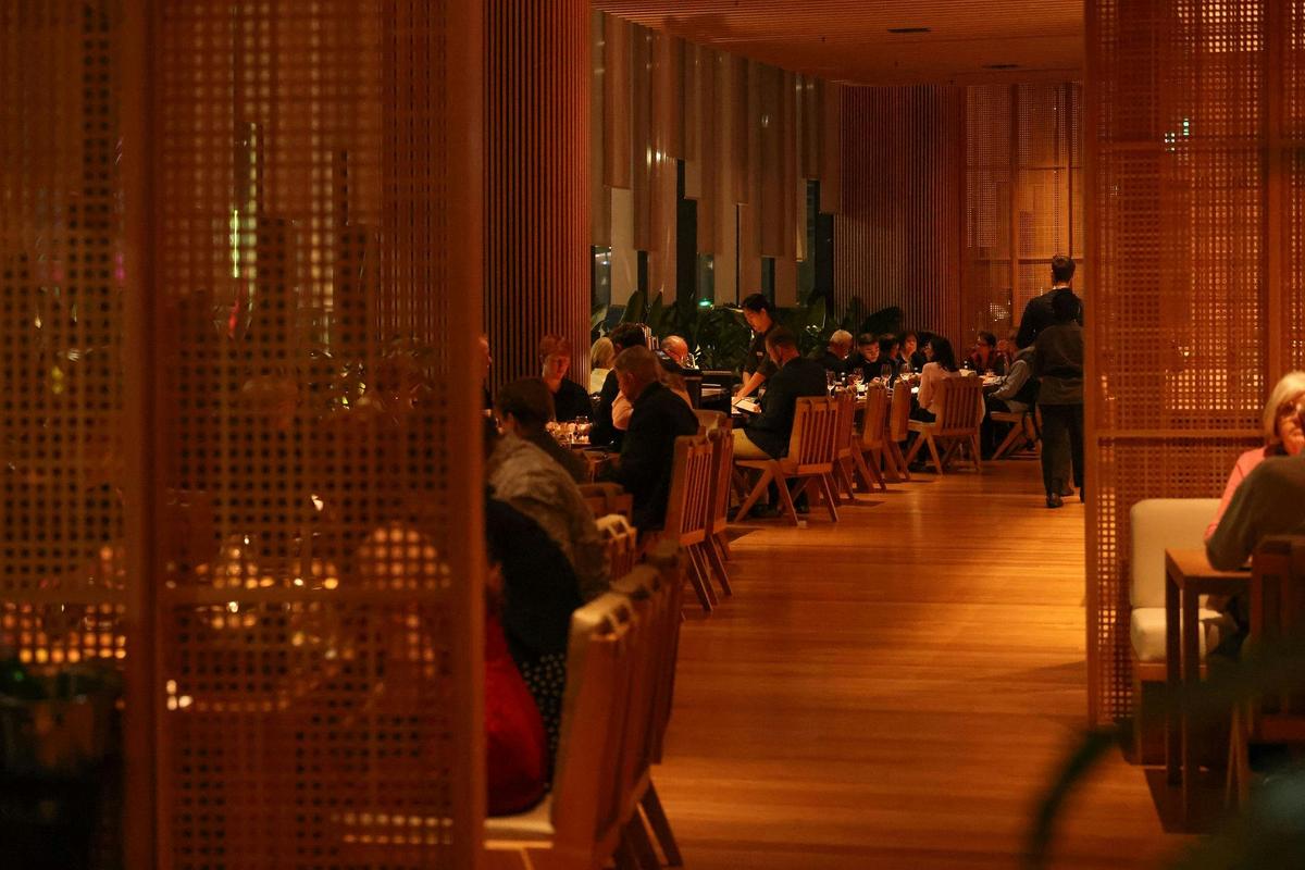 Tables in a moody restaurant setting