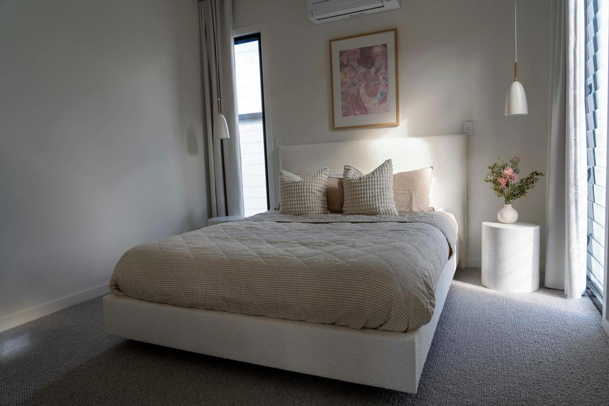 Queen Bedroom with natural sunlight