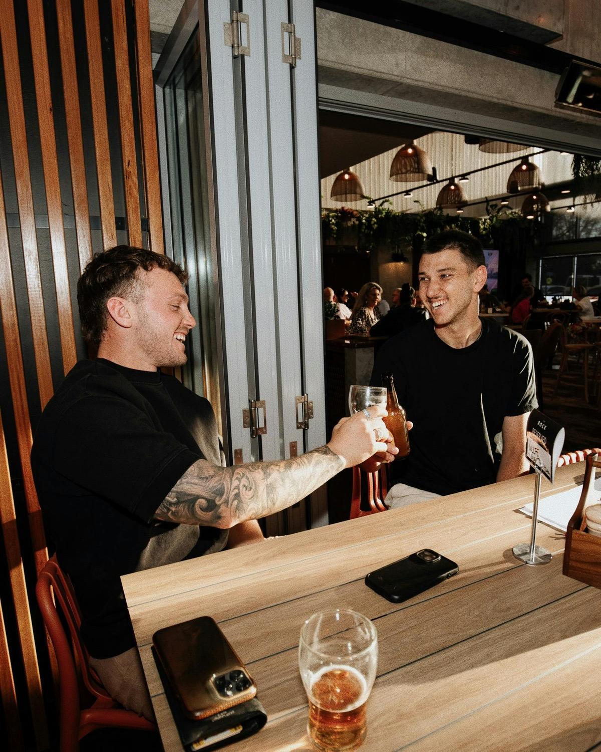 Two men cheers
