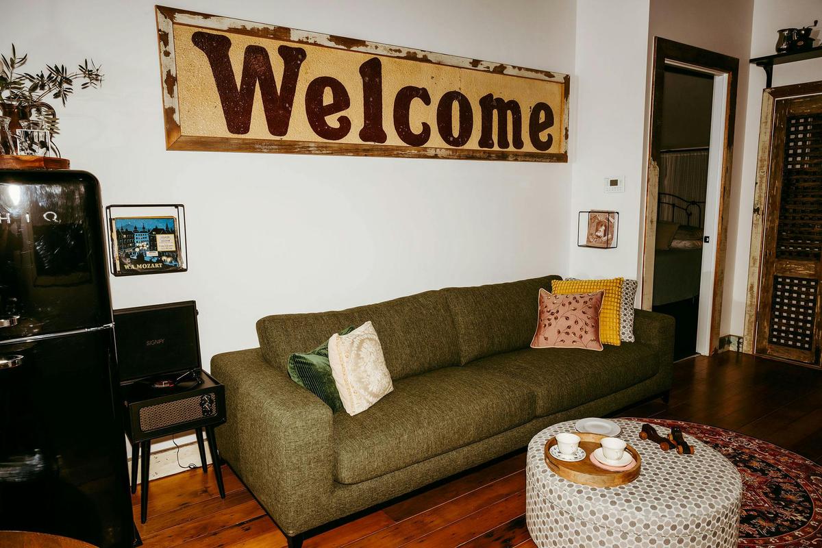 Lounge area with Welcome Signage - once the original shopfront signage