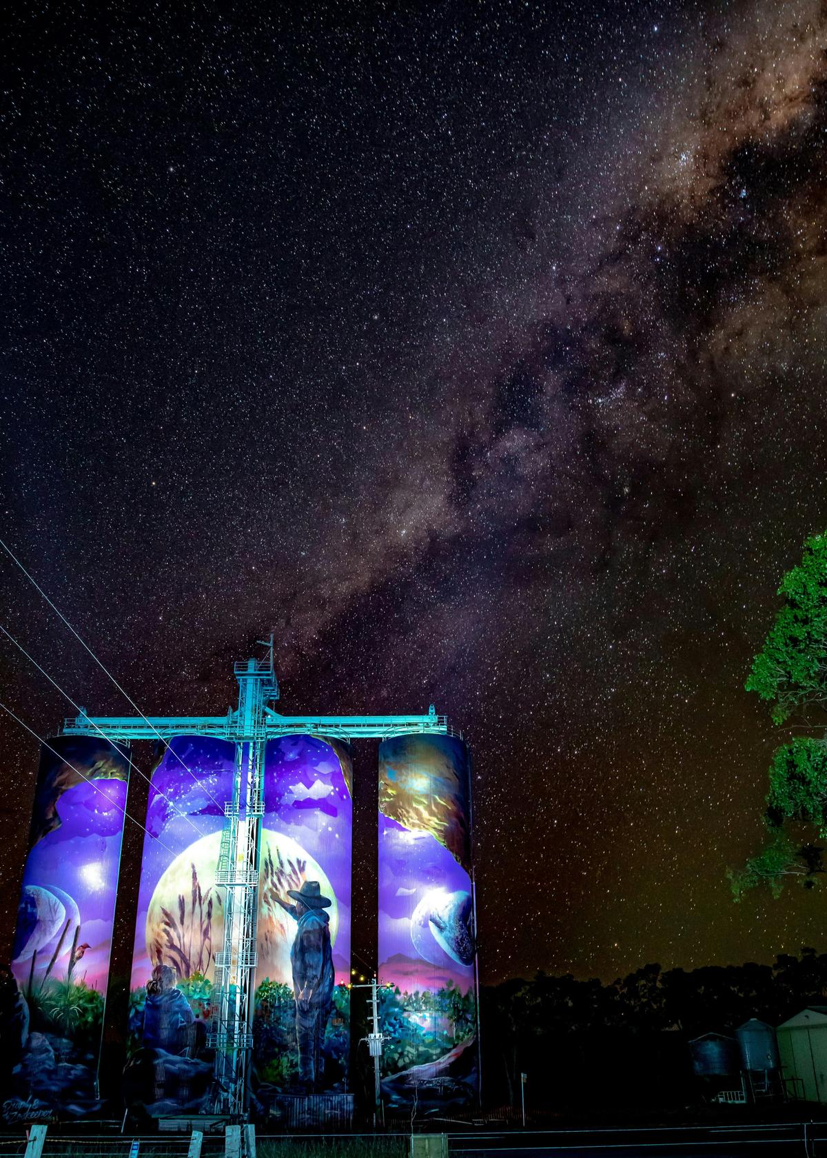 Monto three moon silos at night with the milky way