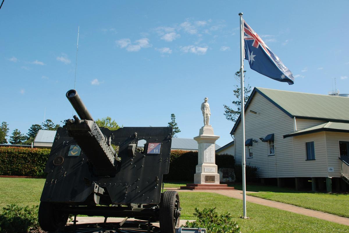 Tiaro War Memorial canon flag and statue