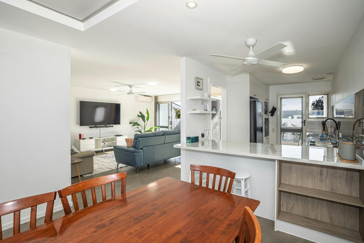 Dining, kitchen and lounge areas