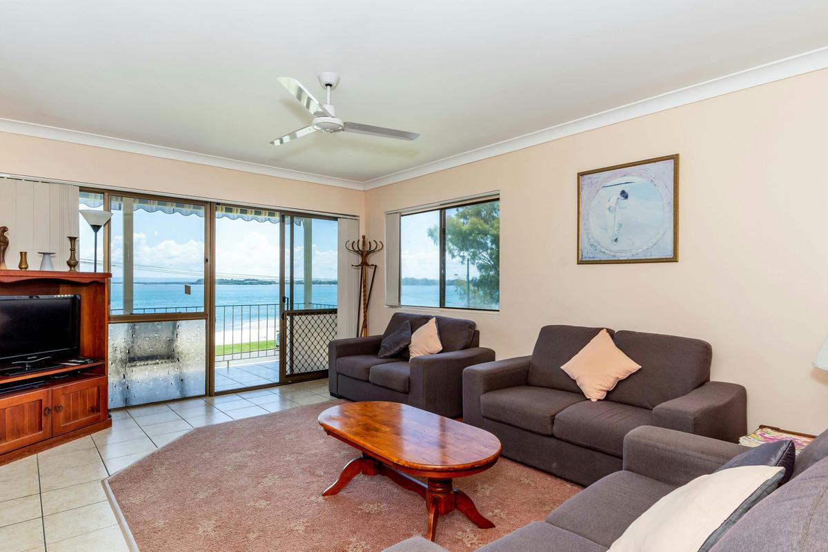 Lounge room with water views