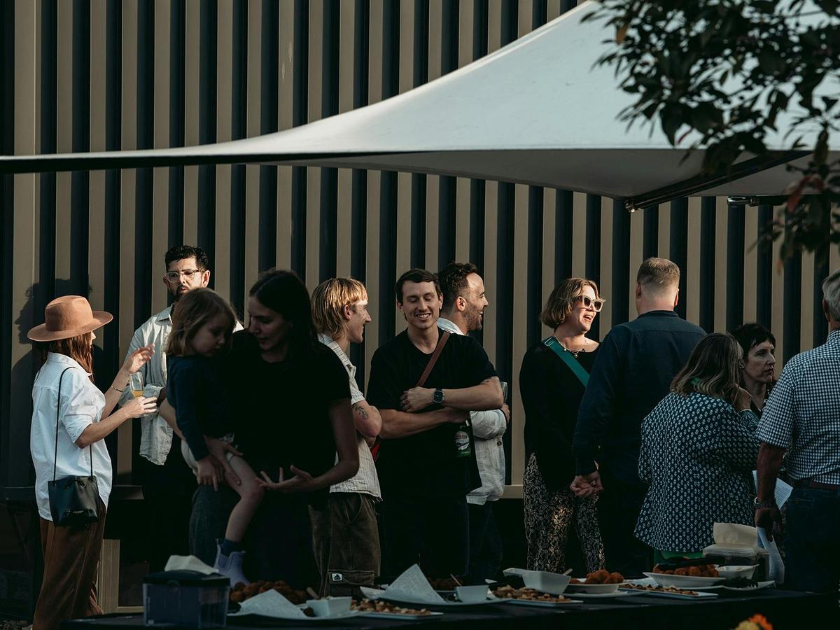 Event guests outside UniSC Art Gallery.